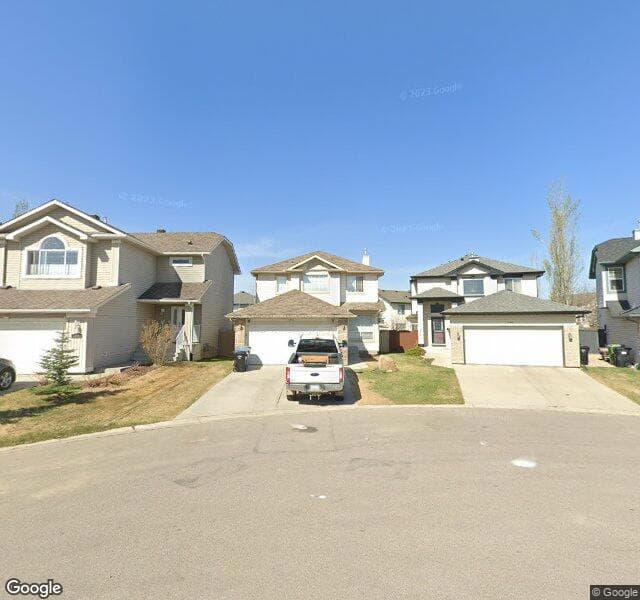 Street view of 222 Coventry Court NE, Calgary