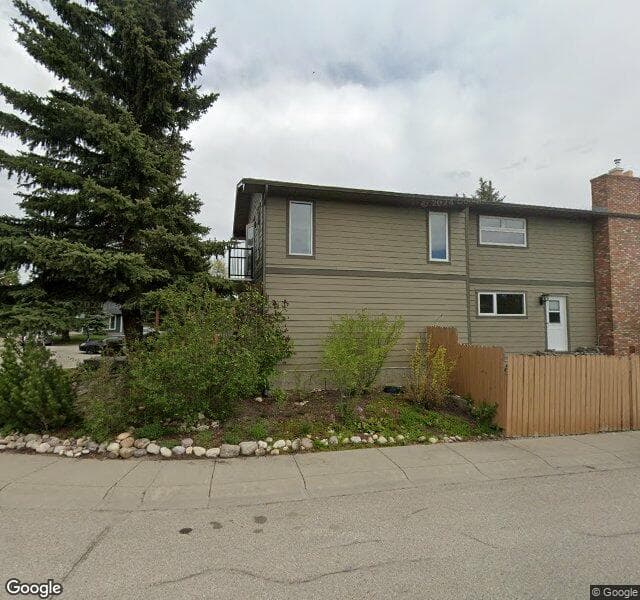 Street view of 104 Deer Side Place SE, Calgary