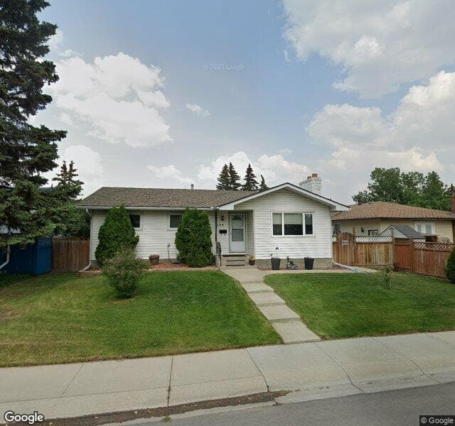 Street view of 128 Rundleview Drive NE, Calgary
