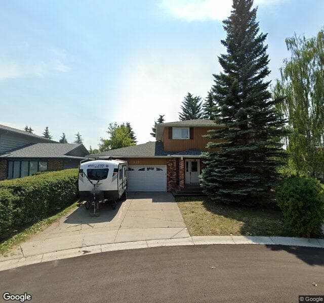 Street view of 232 Woodside Bay SW, Calgary
