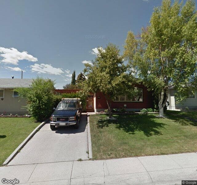 Street view of 1027 Raynard Crescent SE, Calgary