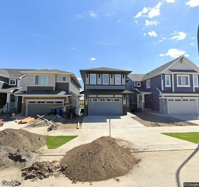 Street view of 1057 Carrington Boulevard NW, Calgary
