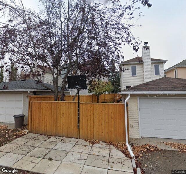 Street view of 223 Coachway Road SW, Calgary