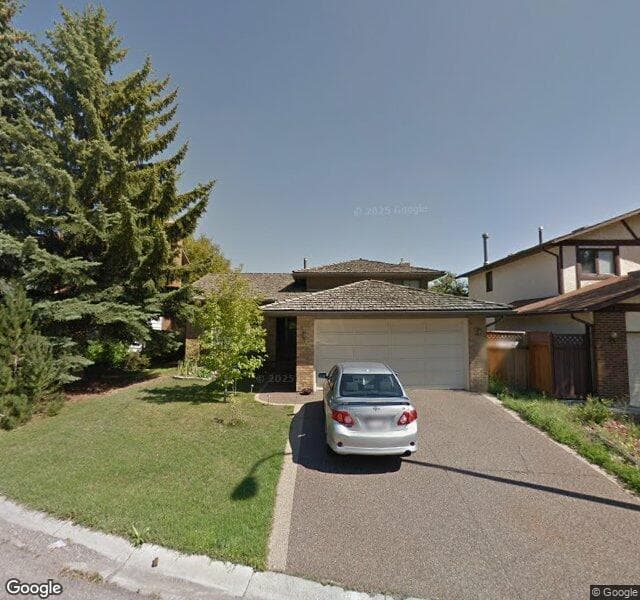 Street view of 144 Woodford Drive SW, Calgary