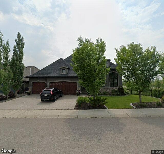 Street view of 11 Cranbrook Way SE, Calgary