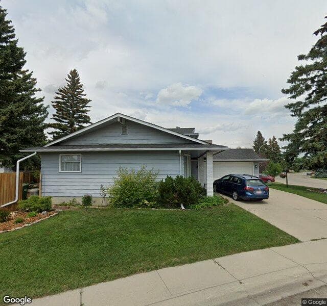 Street view of 1043 Lake Twintree Drive SE, Calgary