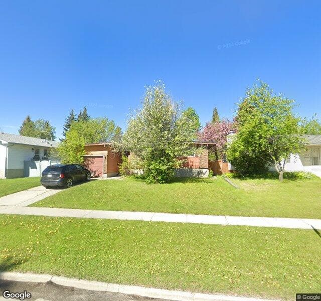 Street view of 10527 Oakfield Drive SW, Calgary