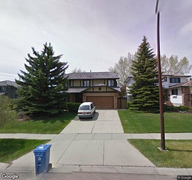 Street view of 11 Woodacres Drive SW, Calgary