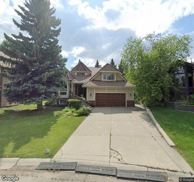 Street view of 219 Coach Grove Place SW, Calgary