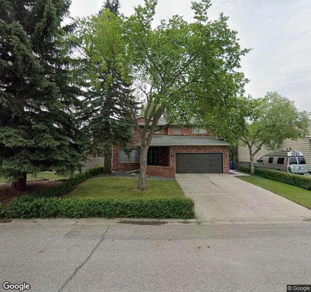 Street view of 2223 Deer Side Drive SE, Calgary
