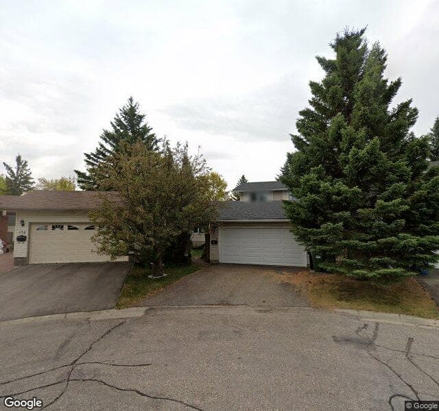 Street view of 128 Woodview Place SW, Calgary