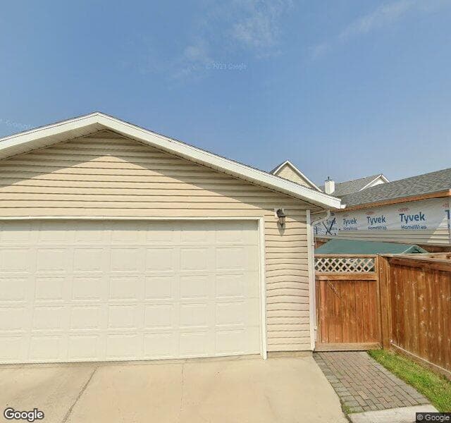 Street view of 14 Prestwick Grove SE, Calgary