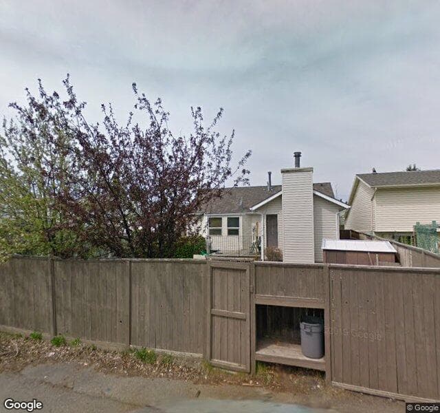 Street view of 11 Woodford Crescent SW, Calgary