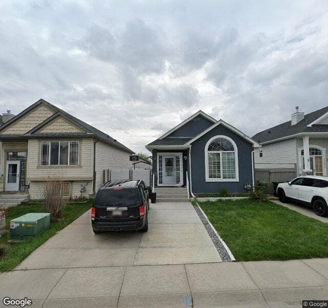 Street view of 1092 Bridlemeadows Manor SW, Calgary