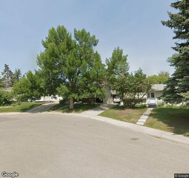 Street view of 120 Lynnbrook Place SE, Calgary