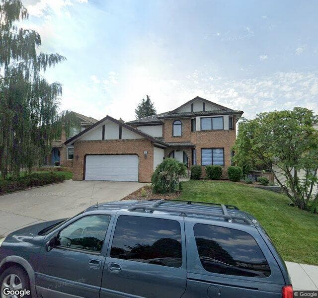 Street view of 19 Woodhaven Crescent SW, Calgary