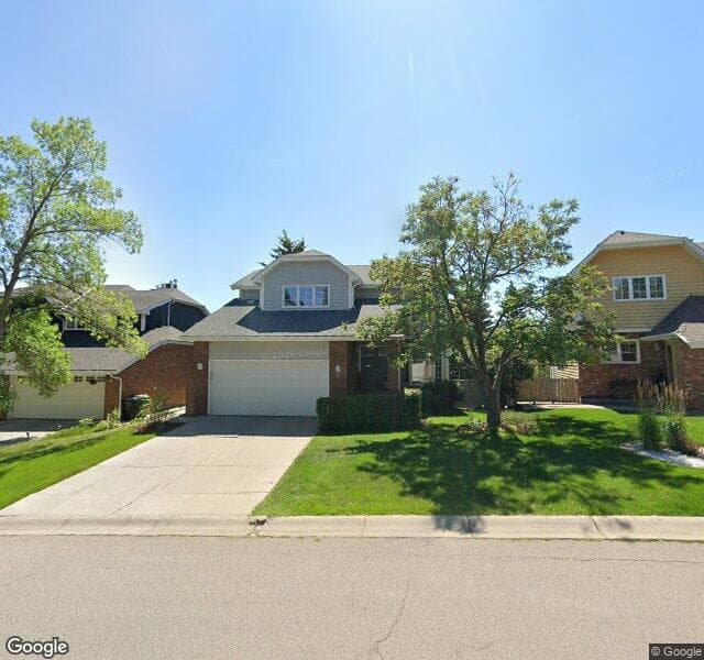 Street view of 32 Stradwick Way SW, Calgary