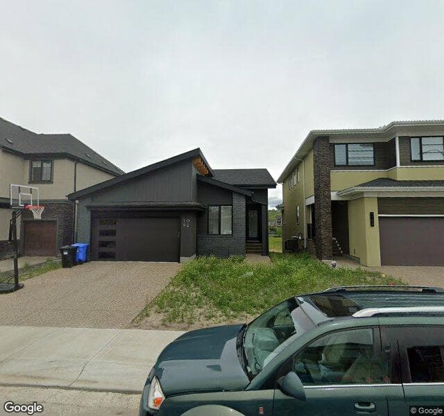 Street view of 1092 Cranbrook Gardens SE, Calgary