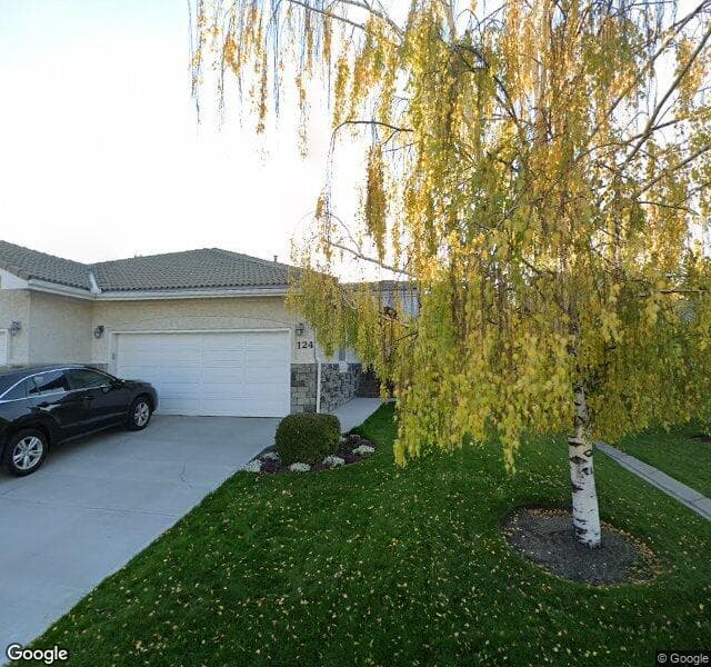 Street view of 124 Pump Hill Landing SW, Calgary