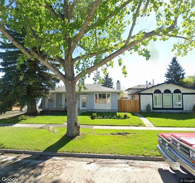 Street view of 10604 Oakfield Drive SW, Calgary