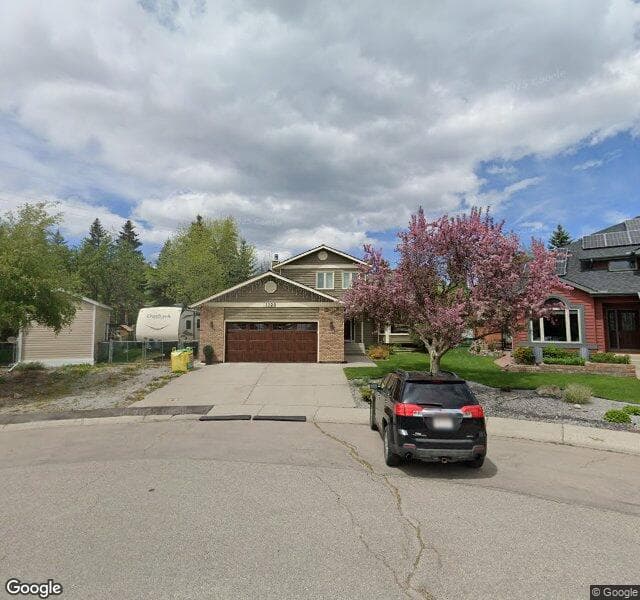 Street view of 1120 Deer River Circle SE, Calgary