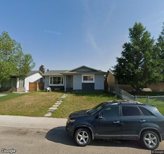Street view of 160 Pinecliff Way NE, Calgary