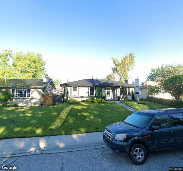 Street view of 1432 Lake Michigan Crescent SE, Calgary