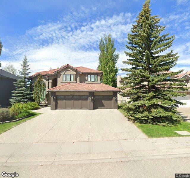 Street view of 16033 Mckenzie Lake Way SE, Calgary