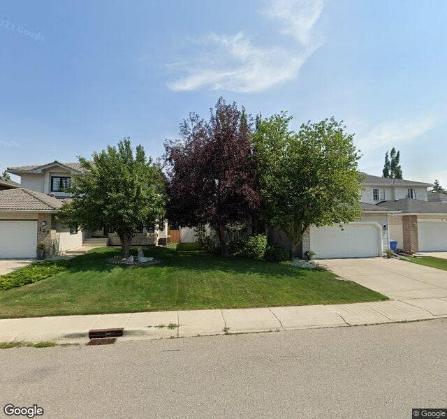 Street view of 175 Woodstock Way SW, Calgary