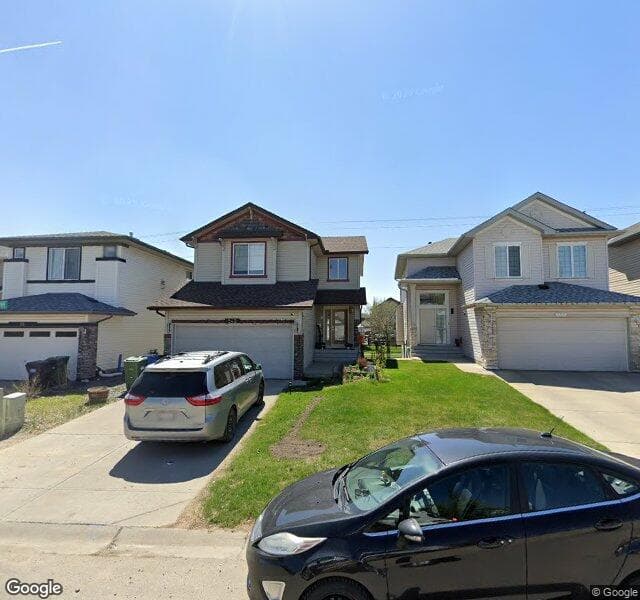 Street view of 242 Panamount Grove NW, Calgary
