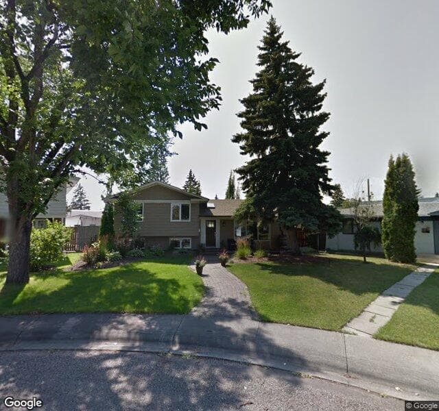 Street view of 35 Lake Patricia Place SE, Calgary