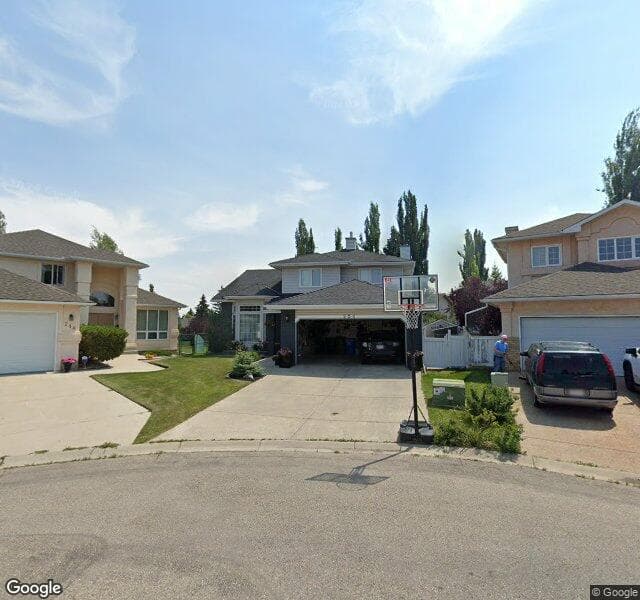 Street view of 220 Woodpark Terrace SW, Calgary