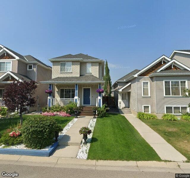 Street view of 222 Cougartown Circle SW, Calgary