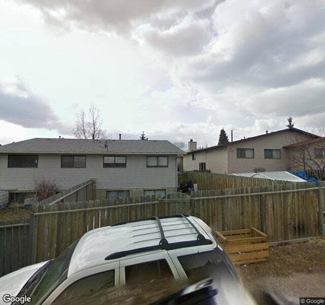 Street view of 16 Ranchero Rise NW, Calgary