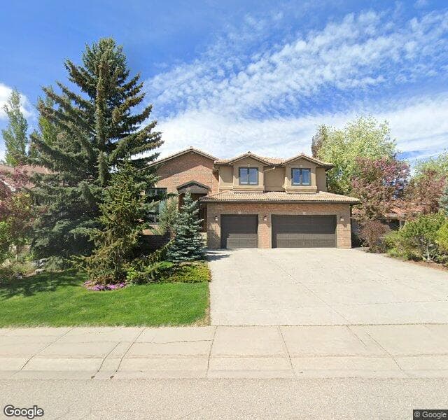 Street view of 16021 Mckenzie Lake Way SE, Calgary
