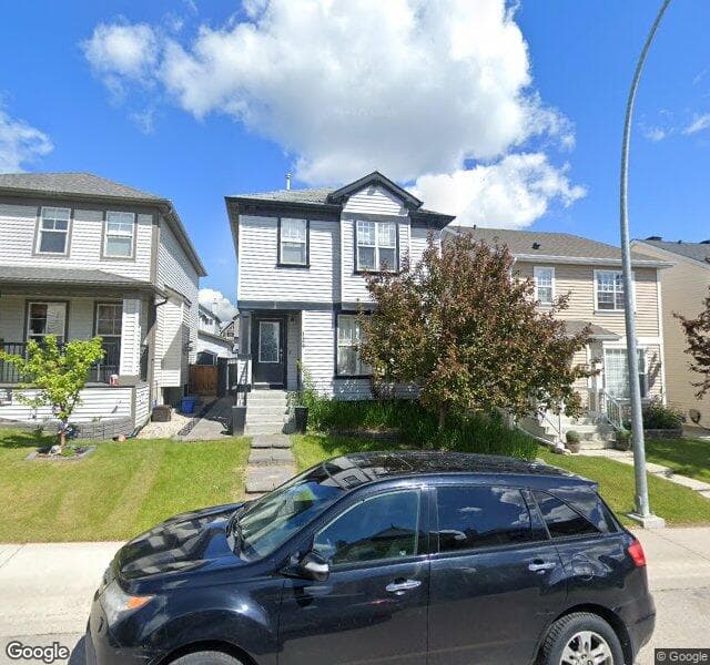 Street view of 124 Tuscany Valley Rise NW, Calgary