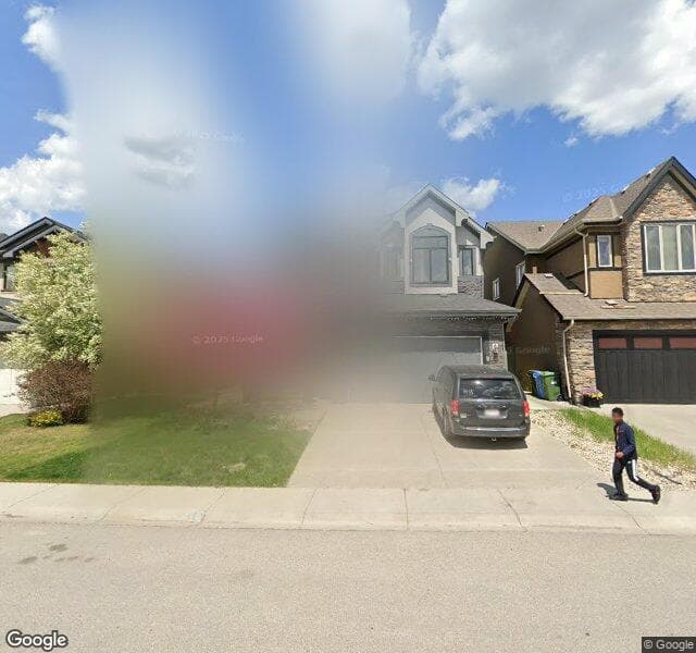 Street view of 117 W Coach Place SW, Calgary