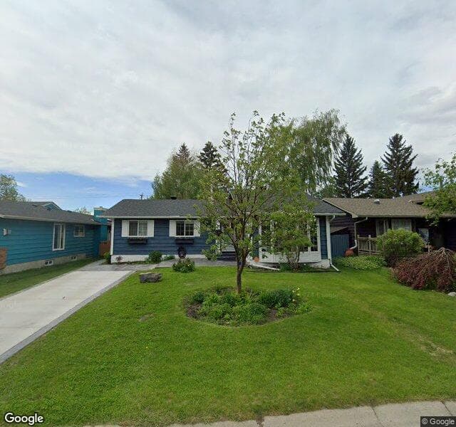 Street view of 2123 Deer Side Drive SE, Calgary