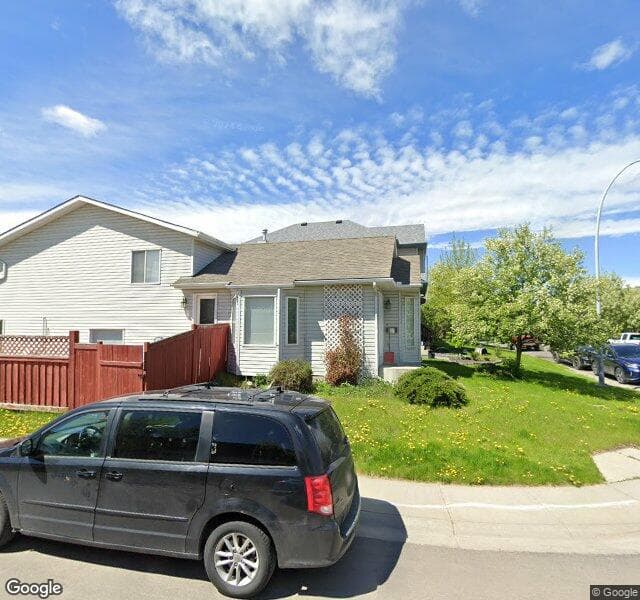 Street view of 252 Mount Apex Green SE, Calgary