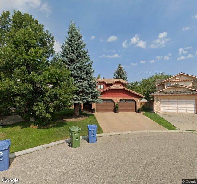 Street view of 135 Woodhaven Place SW, Calgary