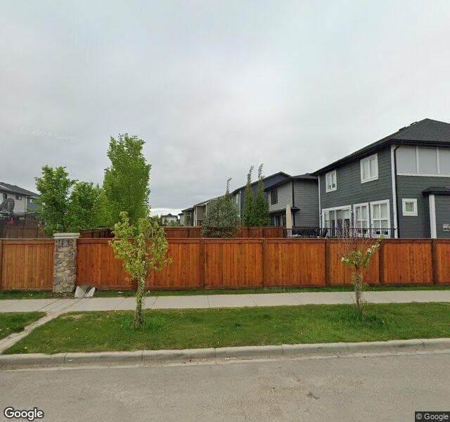 Street view of 18 Cranbrook Cove SE, Calgary