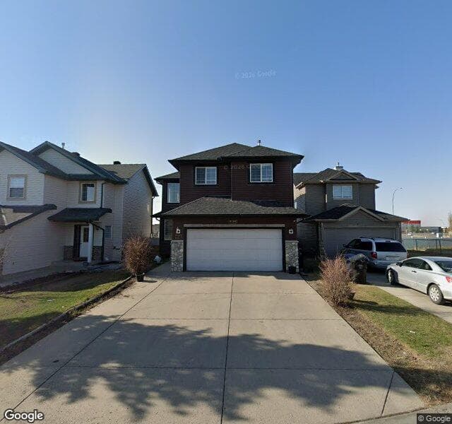 Street view of 113 Saddlecreek Court NE, Calgary
