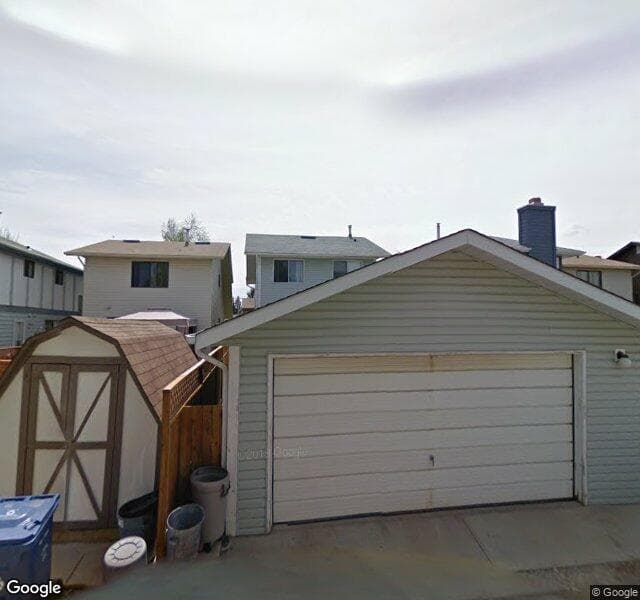 Street view of 134 Woodfield Close SW, Calgary