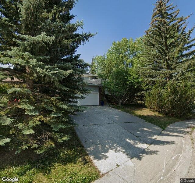 Street view of 164 Oakside Place SW, Calgary