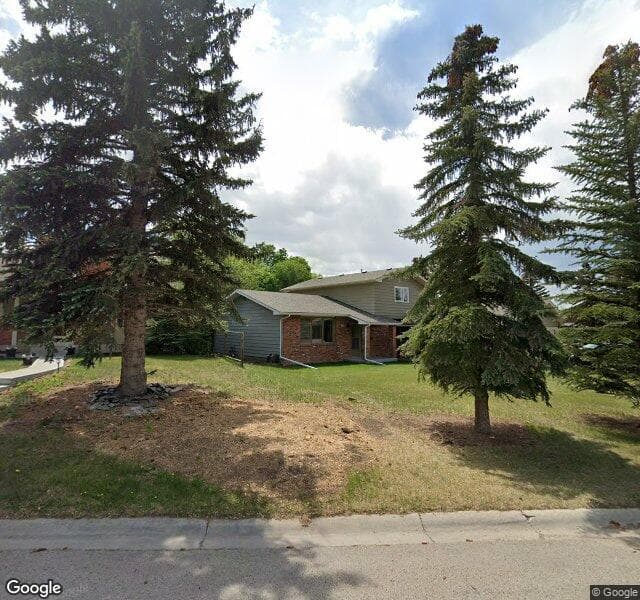 Street view of 100 Dalhurst Way NW, Calgary