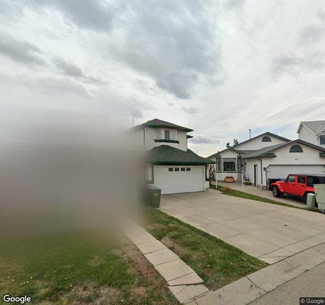 Street view of 107 Saratoga Place NE, Calgary