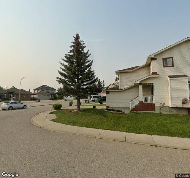 Street view of 105 Scenic View Bay NW, Calgary