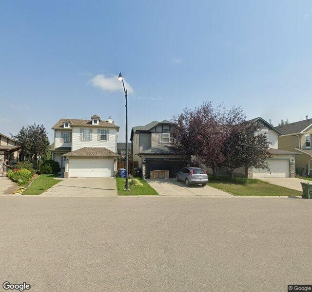 Street view of 12 Cougarstone Cove SW, Calgary