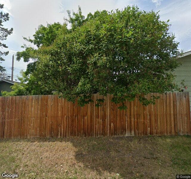 Street view of 1135 Lake Sylvan Place SE, Calgary