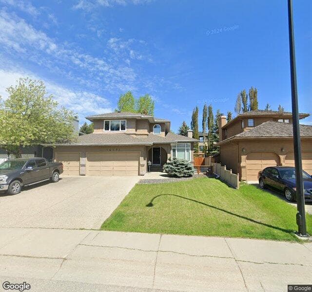 Street view of 16171 Mckenzie Lake Way SE, Calgary
